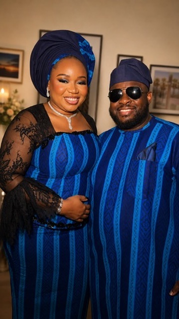 Christabel and Abiola in matching blue traditional outfits